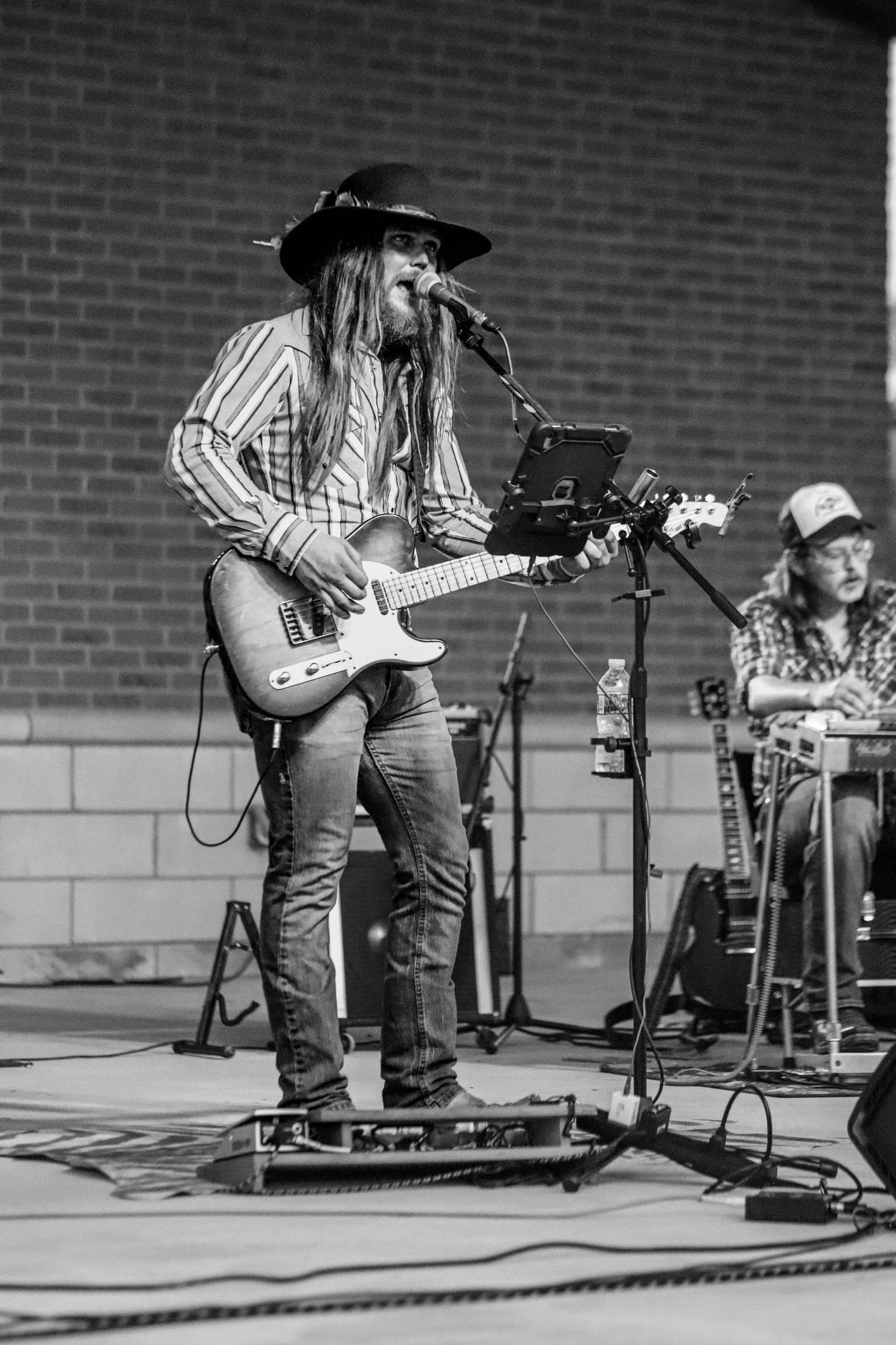 Bryor Rhodes singing with his Telecaster at an outdoor show
